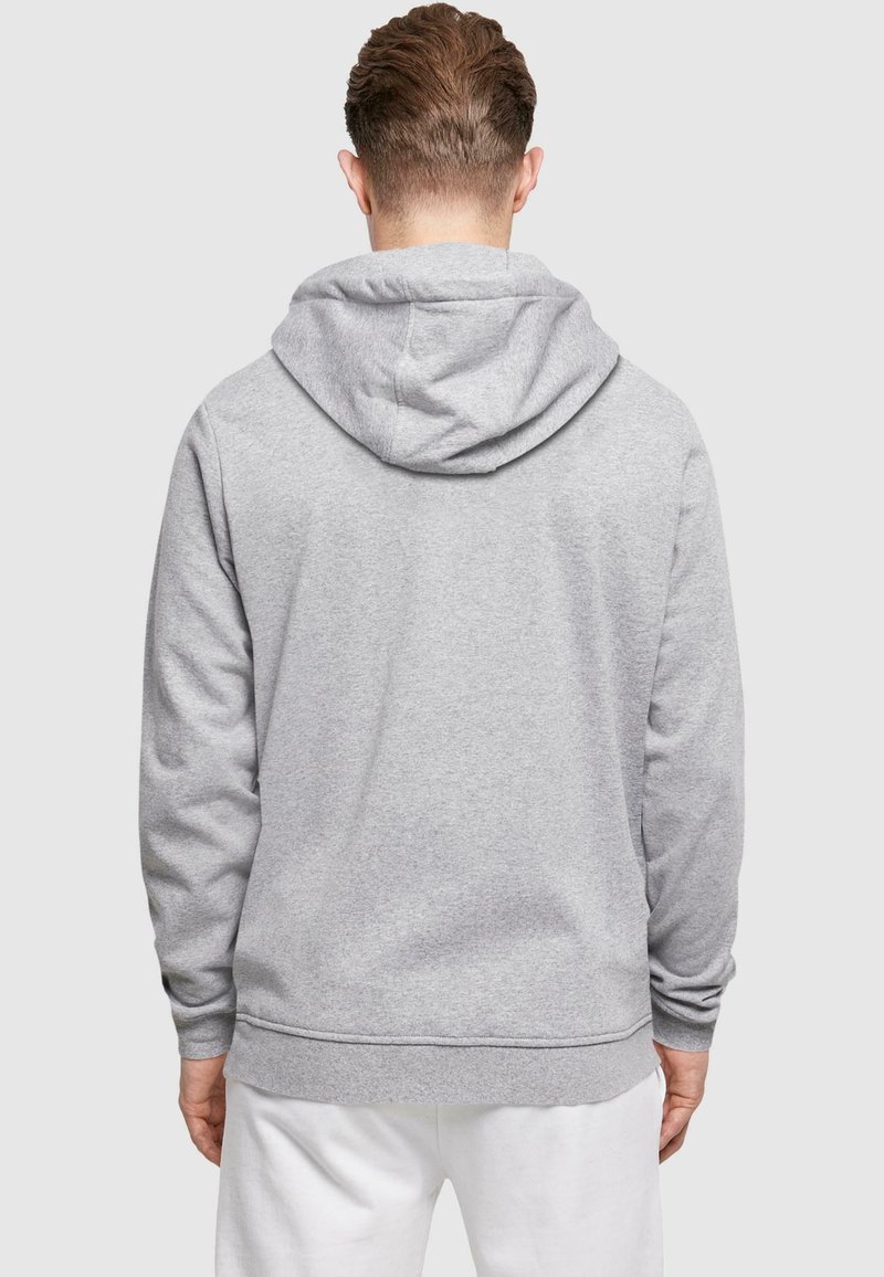 Gray hoodie with a relaxed fit, drawstring hood, and ribbed cuffs and hem. Smooth, soft fabric with a minimalistic design.