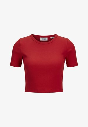 Rdeča rebrasta kratka majica s kratkimi rokavi in okroglim izrezom. Oznaka, vidna znotraj, pravi "JJXX," kar kaže na blagovno znamko in velikost. Gladka tekstura po celotni površini.