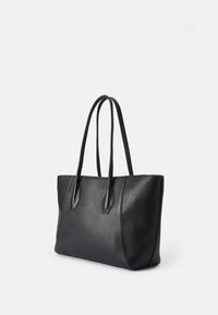 Black leather tote bag with two long handles, textured surface, rectangular shape, and minimalistic design. No visible hardware or accents.