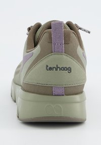 Green and brown sneaker with a textured upper, purple accents, and a padded collar. Features branding on the heel and a thick outsole.