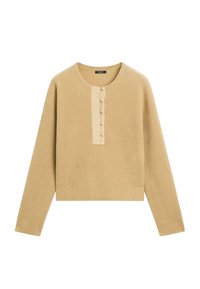 Maglione a maglia color beige chiaro con maniche lunghe e texture a coste. Presenta una patta con bottoni in tessuto a contrasto sulla parte anteriore.
