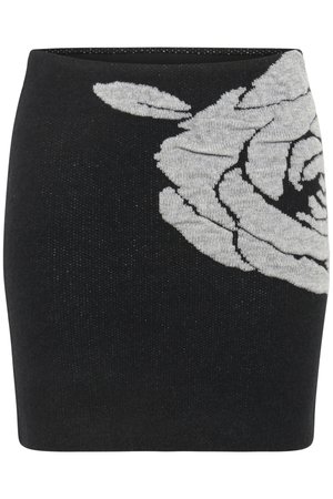 Black knitted mini skirt featuring a large grey rose pattern on one side, with a textured finish and subtle shimmering effect.