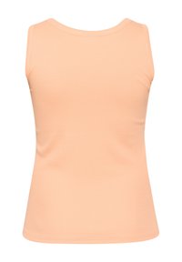 Peach-colored sleeveless top made of soft cotton blend, featuring a round neckline and smooth, fitted design without patterns or accents.