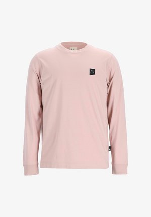 Ilgų rankovių marškinėliai iš minkštos rožinės medvilnės, su mažąju juodu logotipo pleistru kairėje krūtinės pusėje ir banguotomis rankovių iškirpėmis.