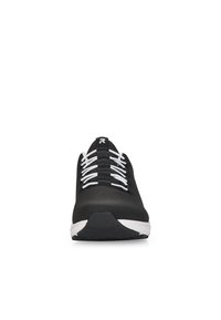 Black athletic shoe with a smooth, synthetic upper, white laces, and a contrasting white midsole; features a rounded toe and textured outsole.