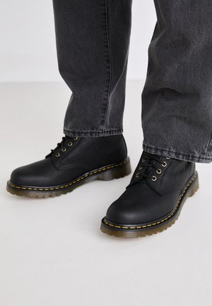 1460 UNISEX - Platform ankle boots - black