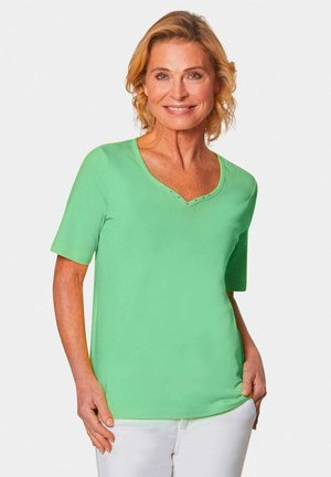 GOLDNER MIT CHARMANTEM AUSSCHNITT - T-Shirt print - light green