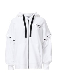 Sudadera blanca con cremallera y capucha, con cordones negros, botones laterales y un logo en el pecho. Tejido suave y corte relajado.