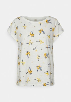 Weiße Bluse mit kurzen Ärmeln und rundem Ausschnitt, verziert mit einem verstreuten gelben und blauen Blumenmuster.