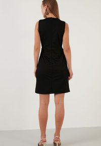 LELA REGULAR FIT - Juhlamekko - black