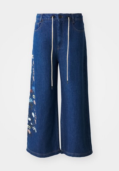 Wide-leg denim trousers in dark blue with floral embroidery detail on the left leg. Features a drawstring waist and classic five-pocket design.