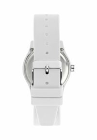 Bracciale per orologio in silicone bianco con fibbia in acciaio inossidabile, caratterizzato da una cassa rotonda argentata e un design minimalista.