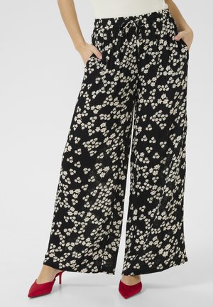 Zwarte bloemmotief wijde broek met witte en roze bloemen. Gemaakt van lichtgewicht stof, met een elastische tailleband en zijzakken.