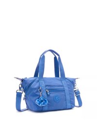 Small blue fabric bag with two top handles, a removable shoulder strap, zip closure, and a furry blue gorilla charm attached.