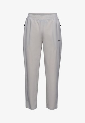 Jasnoszare, lekkie dresy z elastycznym pasem, kieszeniami bocznymi i małym czarnym logo na lewej nodze. Gładka tekstura.