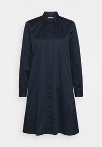 Námořnické modré šaty z hladké tkaniny, s dlouhými rukávy, zapínáním na knoflíky vpředu a uvolněným A-liniovým střihem.