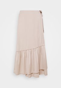 Jupe midi beige en cache-cœur avec un ourlet drapé à volants asymétriques et un détail à nouer à la taille, présentée sur un fond uni.