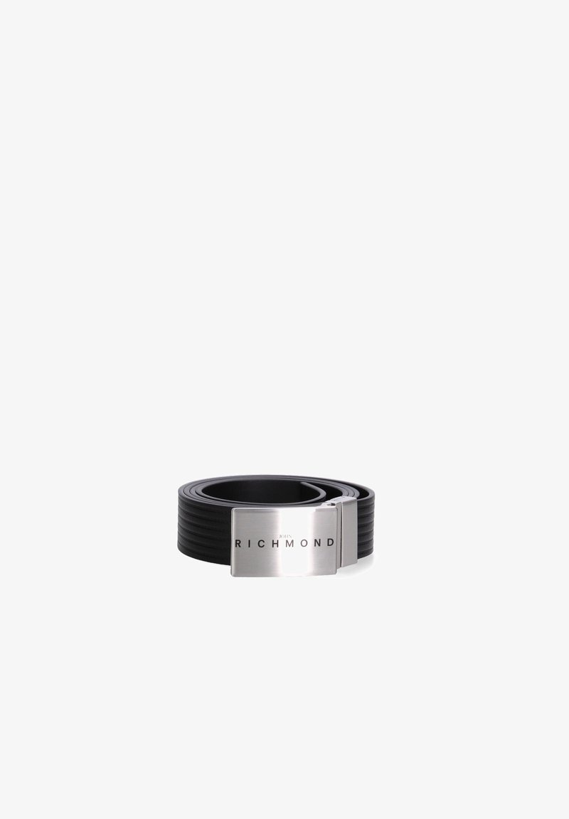 Black leather belt rolled up with a rectangular silver metal buckle engraved with "JOHN RICHMOND" in black letters.