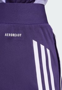 Purple athletic shorts featuring a wide elastic waistband. Notable white vertical stripes and the "AEROREADY" logo on the front.