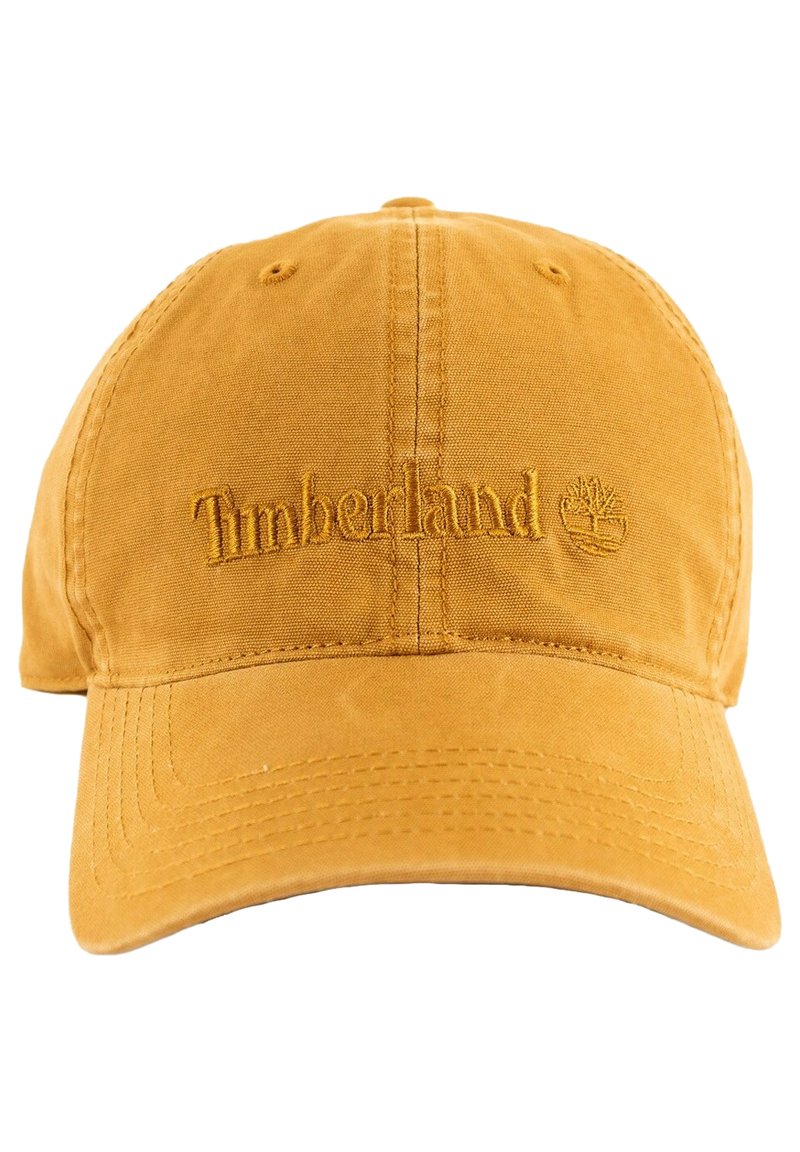 Yellow cotton baseball cap featuring embroidered "Timberland" logo and tree emblem. Soft texture with a curved brim and adjustable back strap.
