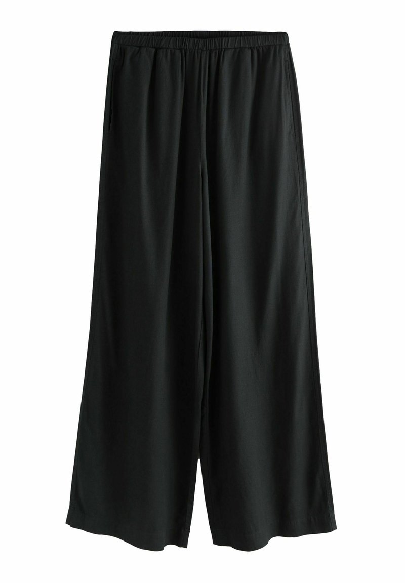 Zwarte wijde broek met een elastische tailleband. Gemaakt van een zachte, lichte stof, met een gladde textuur en een relaxte pasvorm.