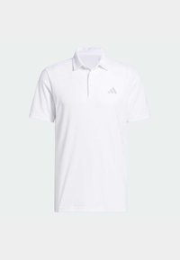 Άσπρο πόλο μπλουζάκι από υφασμάτινη υφή, με μυτερό γιακά, κοντά μανίκια και διακριτικό γκρι λογότυπο στο αριστερό στήθος.