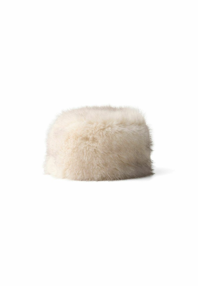 Fluffige, runde Kunstfellmütze in Cremefarbe mit weicher Textur. Verfügt über ein nahtloses Design und ein dickes, plüschiges Aussehen.