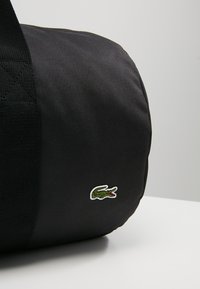 Lacoste ROLL BAG - Sports bag - black
