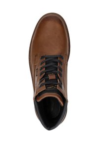 Brown leather high-top shoe with black laces and a padded collar. Features a rounded toe and a textured surface. Subtle branding accent.
