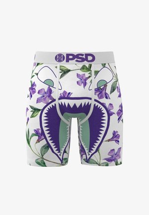 Boxershorts i letvægtsstof med en hvid bundfarve, lilla blomsterprint og et grønt hajmund-design på fronten.