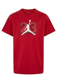 T-shirt in cotone rosso con maniche corte, caratterizzata da un logo silhouette bianco di Jordan e un ampio grafiche nera "23" sul davanti. Vestibilità regolare.