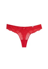 Rød blonde stringtrusse med blomster mønstre, en lille central sløjfe og gennemsigtige paneler for et delikat udseende. Glat stof med bølgede kanter.