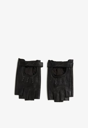 Mustast nahkavad sõrmeotsadeta kindad, millel on tekstuuriga viimistlus. Kindad on varustatud randme rihmaga ning väikeste kaunistavate nupudega sõrmedel.