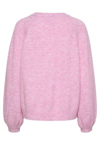 Rosa tröja med ett mjukt, strukturerat tyg, breda raglanärmar och ribbade manschetter, med en något lös passform och rund halsringning.