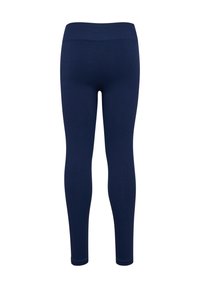 Marinbl�å grövda leggings med en stretchig midja, figurnära design och inga synliga sömmar. Längd till mitt på vaden. Mjuk textur.