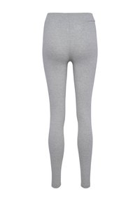 Grijze legging van zacht materiaal, met een hoge tailleband en een aansluitende pasvorm, zonder zichtbare patronen of accenten.
