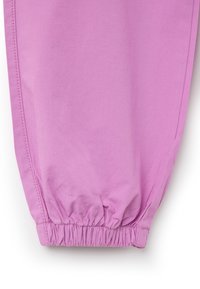 Pink fabric pants with a gathered ankle. Smooth texture, breathable material, featuring side seams and elasticated cuffs for fit.