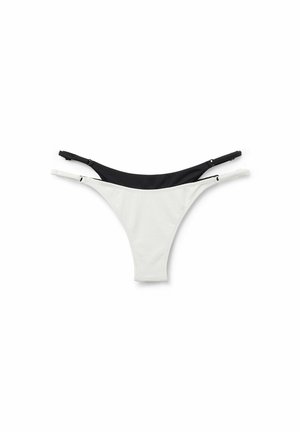 Tweekleurige bikini-bodem met een witte textuur aan de voorkant en een zwarte gladde achterkant. Inclusief dunne verstelbare bandjes voor een comfortabele pasvorm.