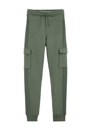 Pantalon jogger vert olive avec taille à cordon, deux poches latérales zippées et poches cargo à rabat sur chaque cuisse, poignets côtelés aux chevilles.