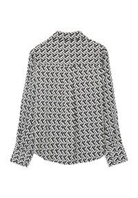 Black and white chevron patterned shirt with long sleeves, collar, and buttoned cuffs. Lightweight fabric, relaxed fit, and pleated back detail.