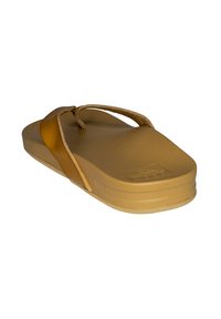 Brown rubber flip-flop with a flat sole, soft straps, and a slightly raised heel. Features a simple, seamless design with no visible patterns.