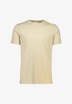 Beige kortærmet t-shirt lavet af blødt stof, med rund halsudskæring og præget "LINDBERGH" logo på brystet.