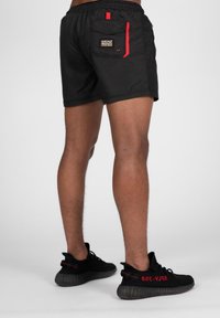 Wrong Friends LUGO - Shorts - black