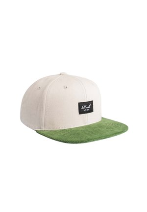 Beige Sechspanel-Cap mit grünem Cord-Flatbrim und schwarzem rechteckigem Etikett mit der Aufschrift „Reell est. 1997“ auf dem Frontpanel.