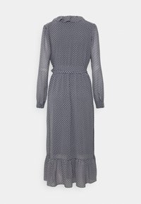 Robe midi bleu marine à manches longues avec motif géométrique blanc, taille cintrée et ourlet à volants, vue de dos.