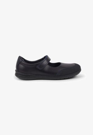 Chaussure Mary Jane bleu marine, tige en cuir avec semelle en caoutchouc texturée, sangle réglable, bout rond et détails de surpiqûre en contraste.