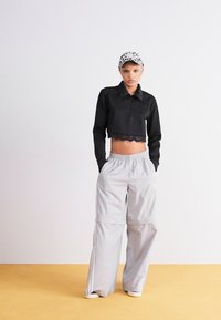 adidas Originals ZIP OFF - Tréningruha alsók - grey two