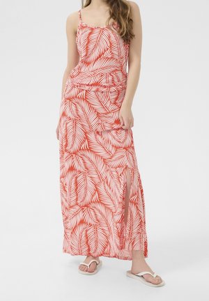 Maxi-jurk in levendig rood met een wit bladmotief, voorzien van spaghettibandjes en een zijsplit. Zachte, lichtgewicht stof met een ontspannen pasvorm.