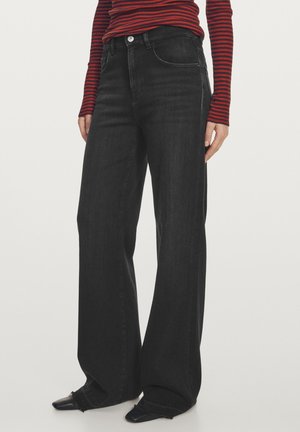 MID-RISE  - Flared Jeans - black