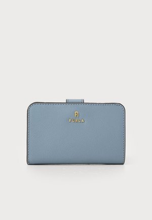 Light blue textured leather wallet with gold "FURLA" logo, rounded edges, and a clasp closure. Compact rectangular shape.